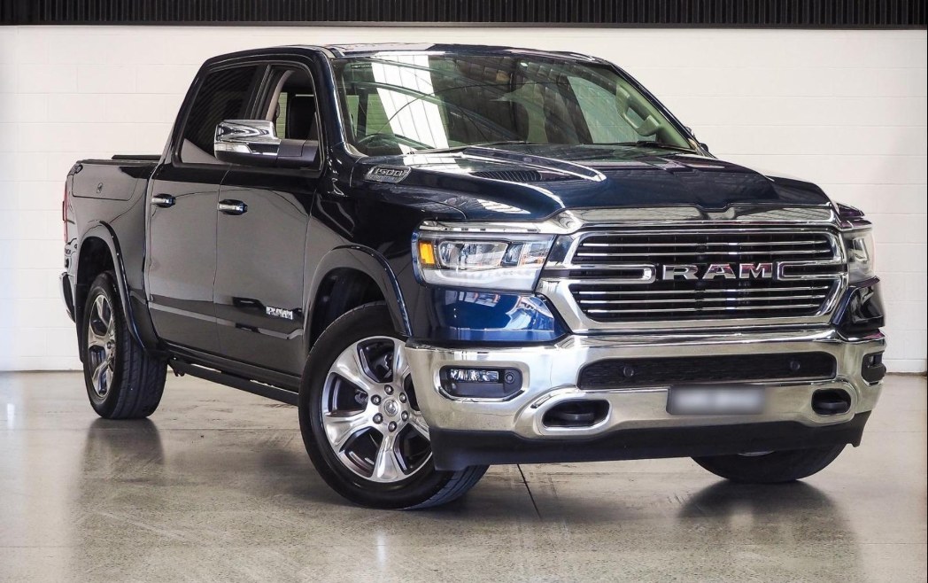 Blue RAM 1500 front three-quarter view, serviced across the Sunshine Coast
