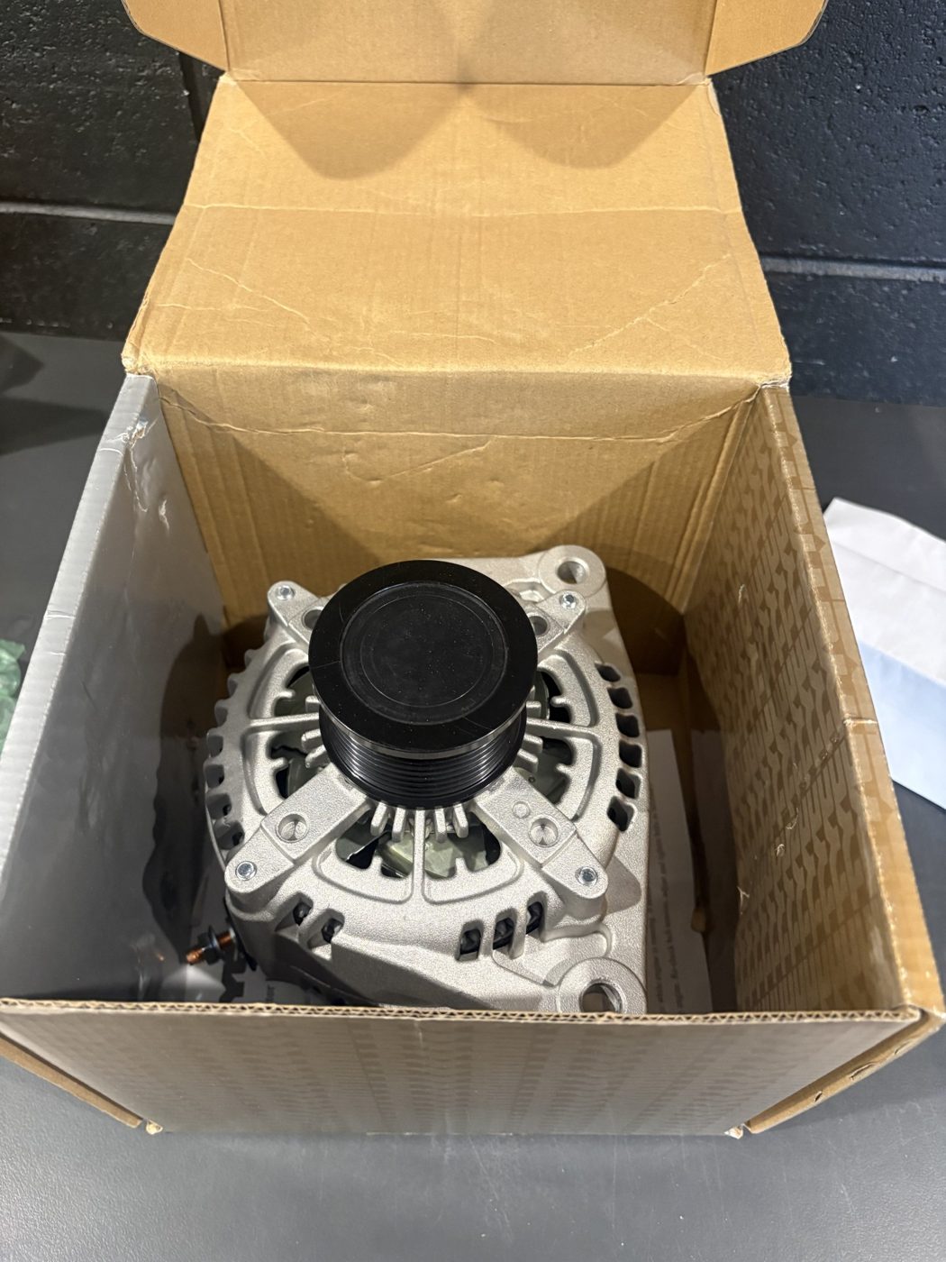 220 amp high-output alternator sourced for a RAM 2500, up from the factory 185 amp unit