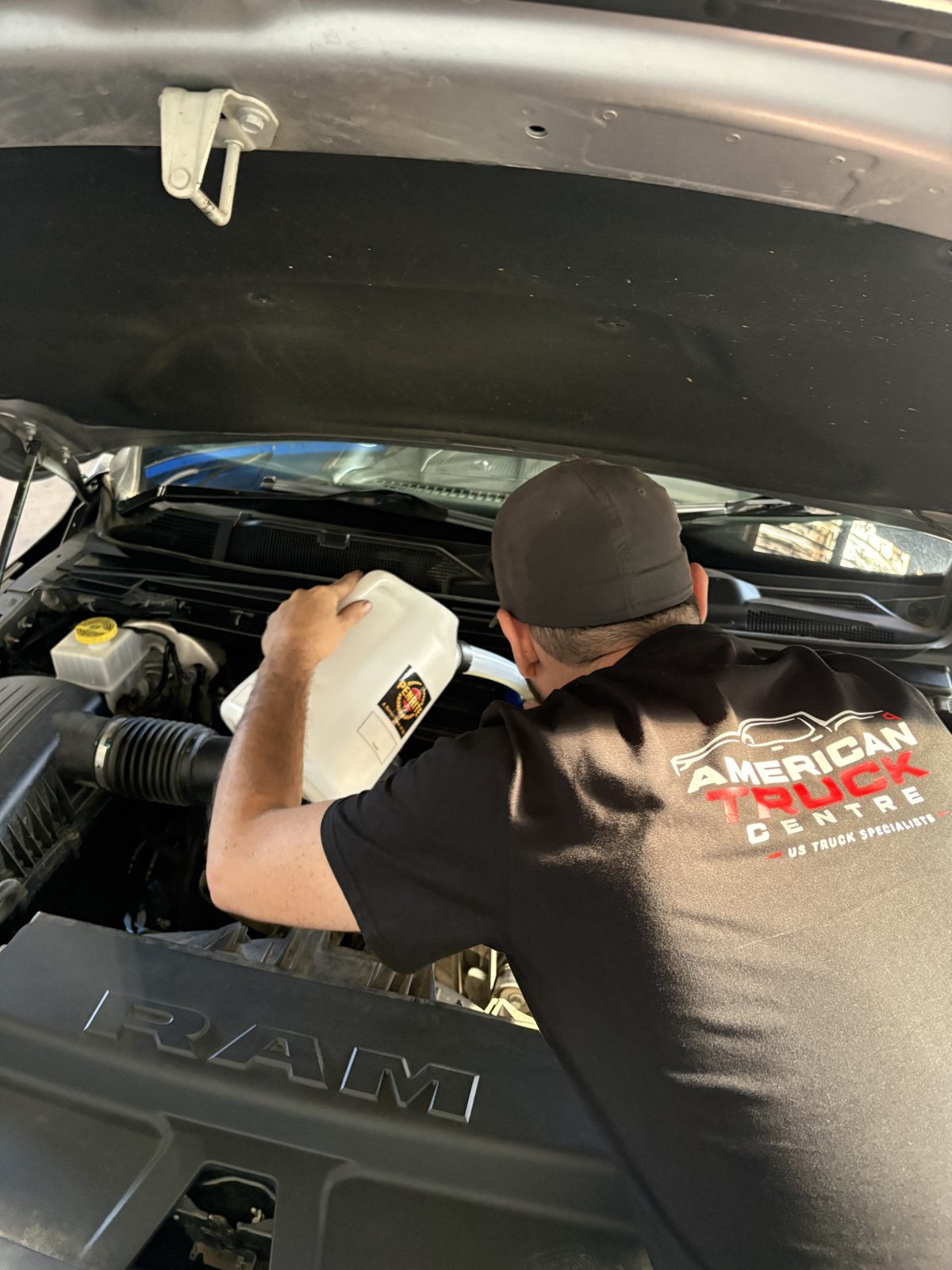 American Truck Centre technician carrying out an oil service on a RAM 1500