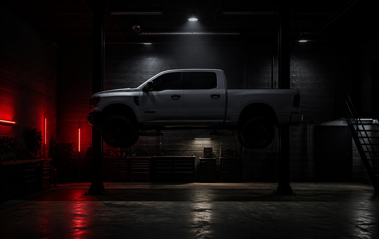 American Truck Centre workshop with a full-size US pickup on the hoist