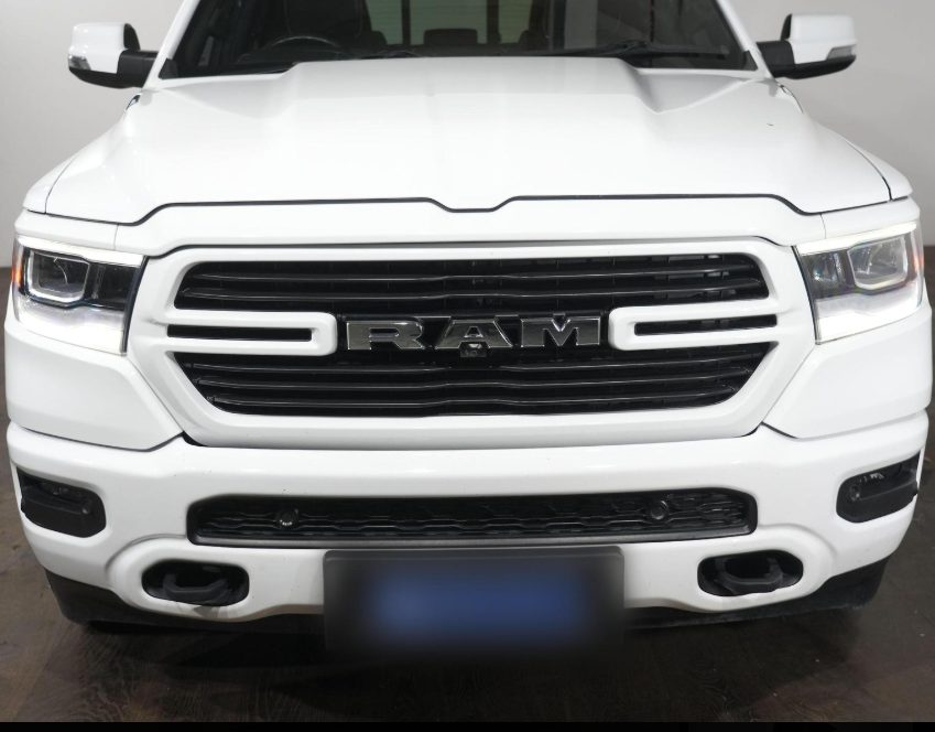 White RAM 1500 front view