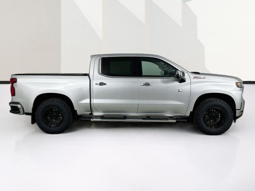 Silver Chevrolet Silverado 1500 side profile